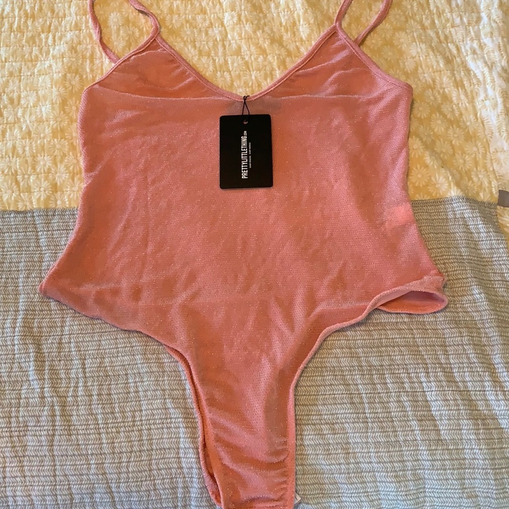 Light pink textured strappy bodysuit
